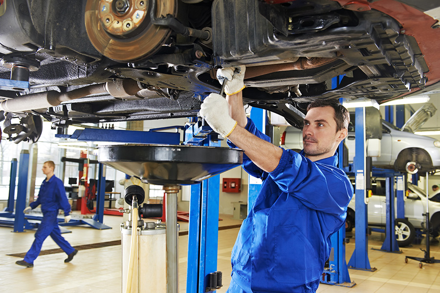Service technician performing maintenance at Jessup Auto Buick GMC