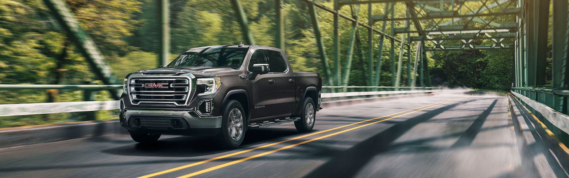 black GMC Sierra 1500 on road