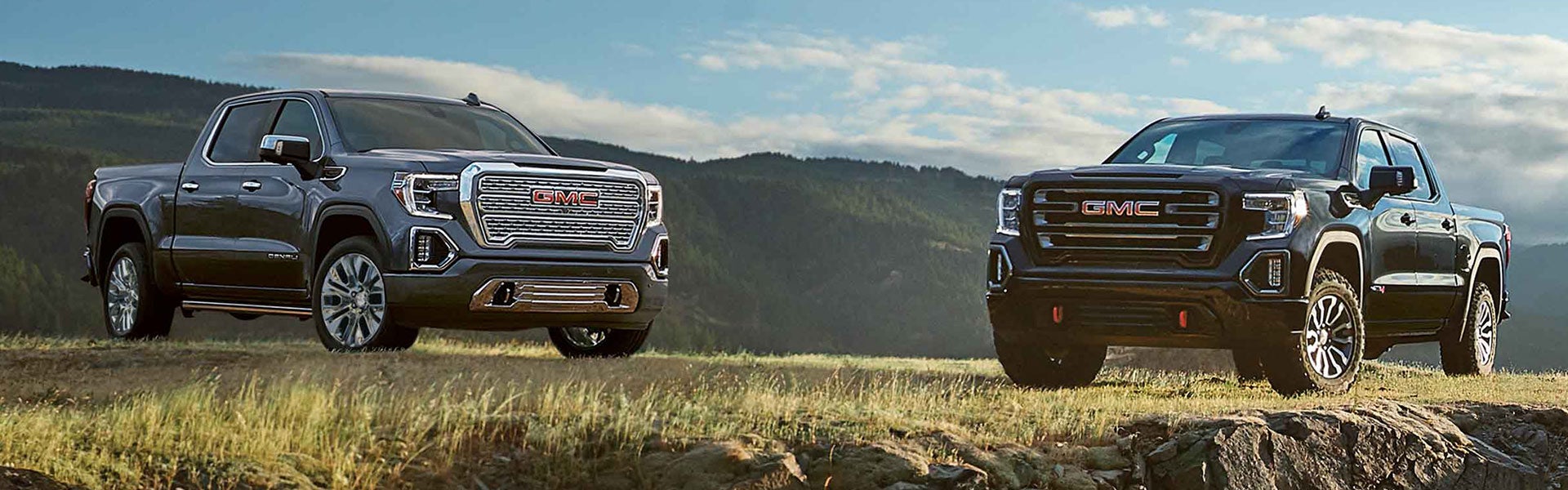 two GMC Sierra 1500